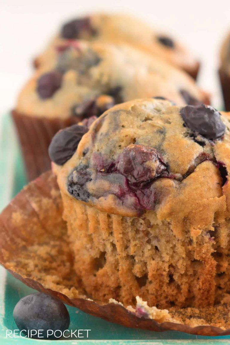 Close up of blueberry muffins in a muffin case.