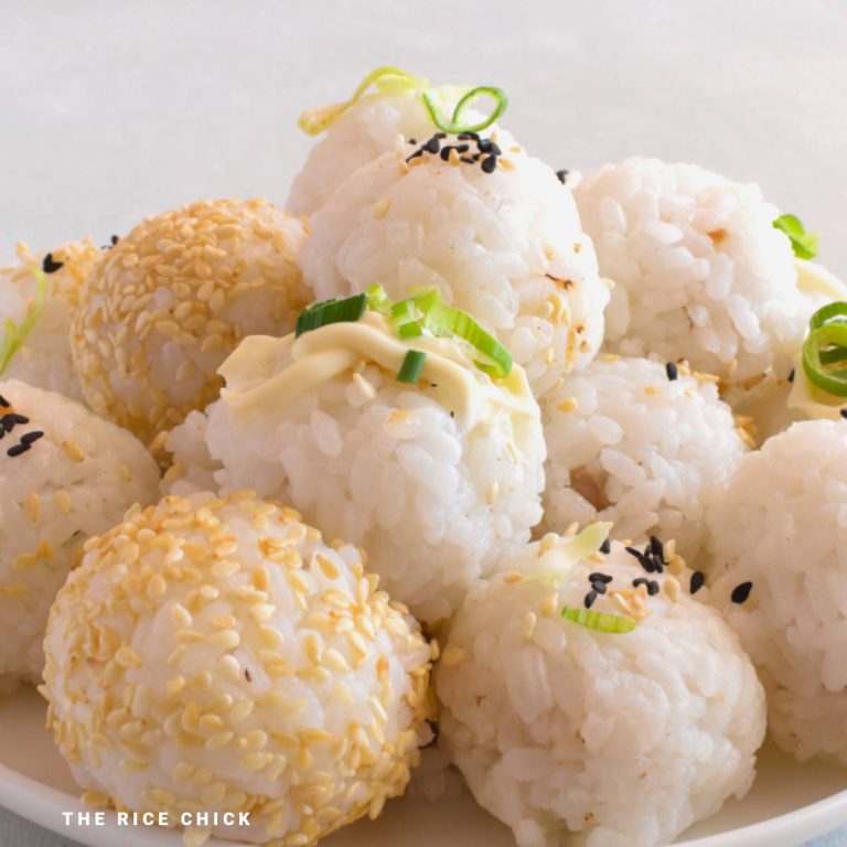 Chicken rice balls in a pile on a plate.