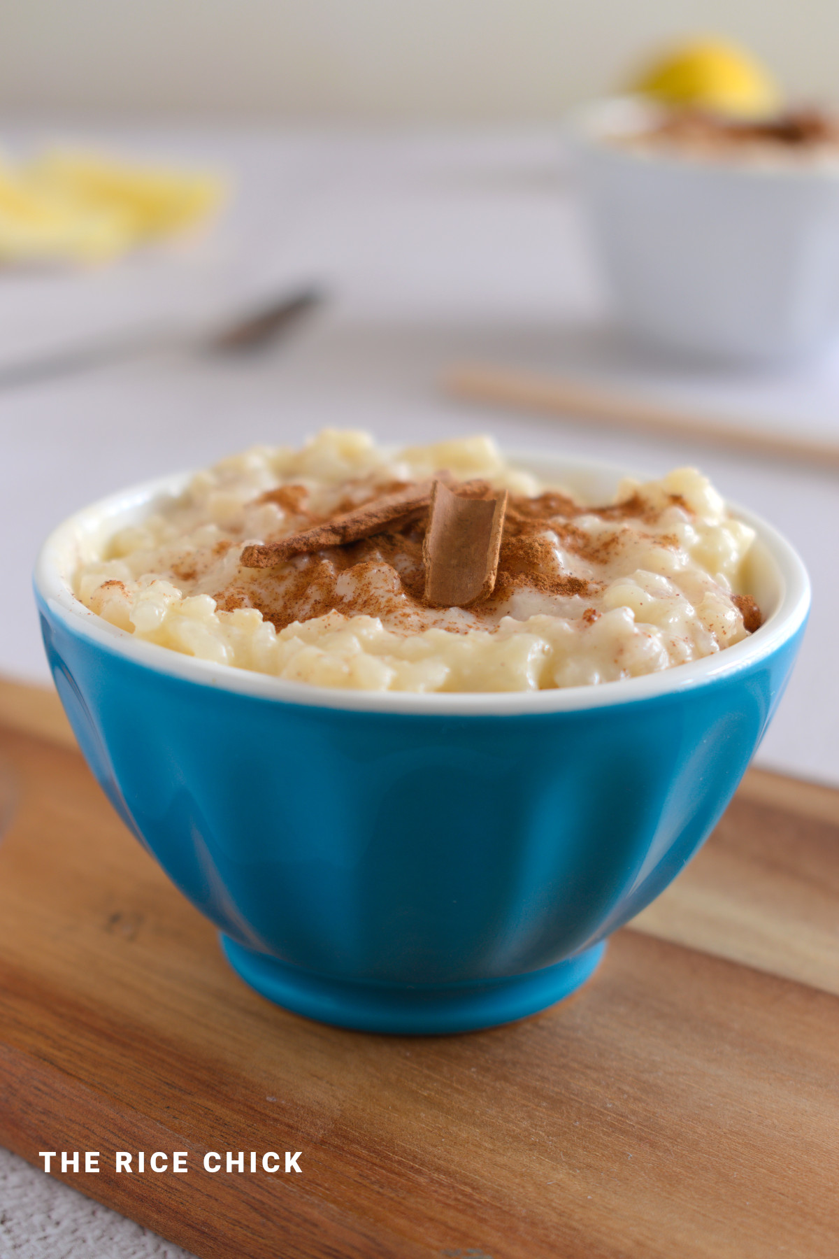 Arroz doce pudding in a small blue bowl.