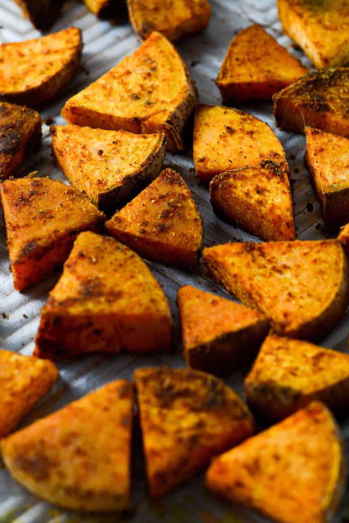 Close up image of sliced roasted sweet potatoes.