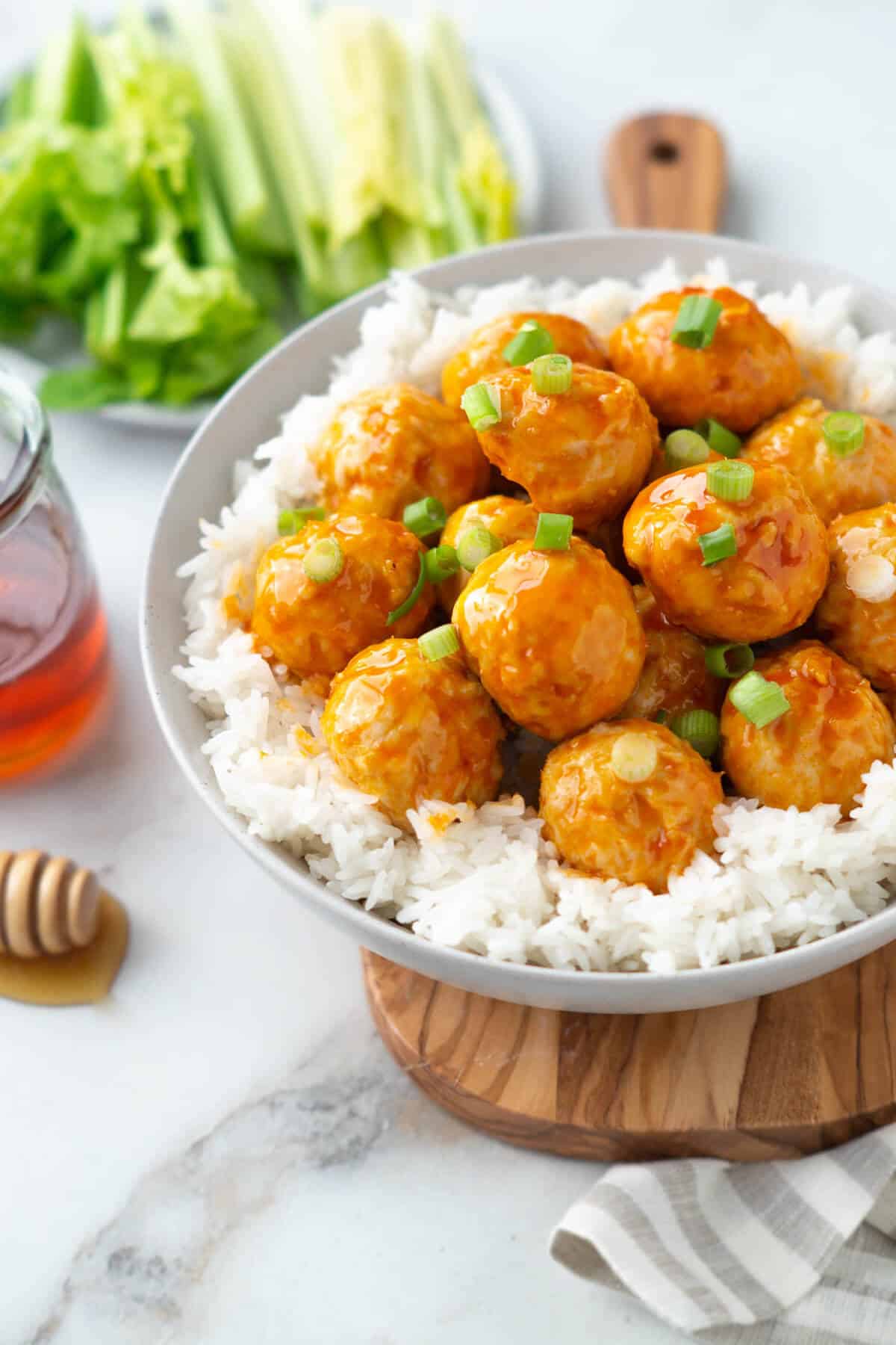 Buffalo turkey meatballs and rice in a bowl.