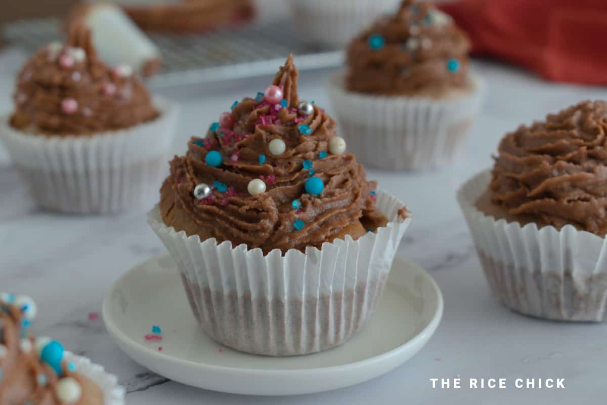 Close up image of frosted chocolate cupcakes.