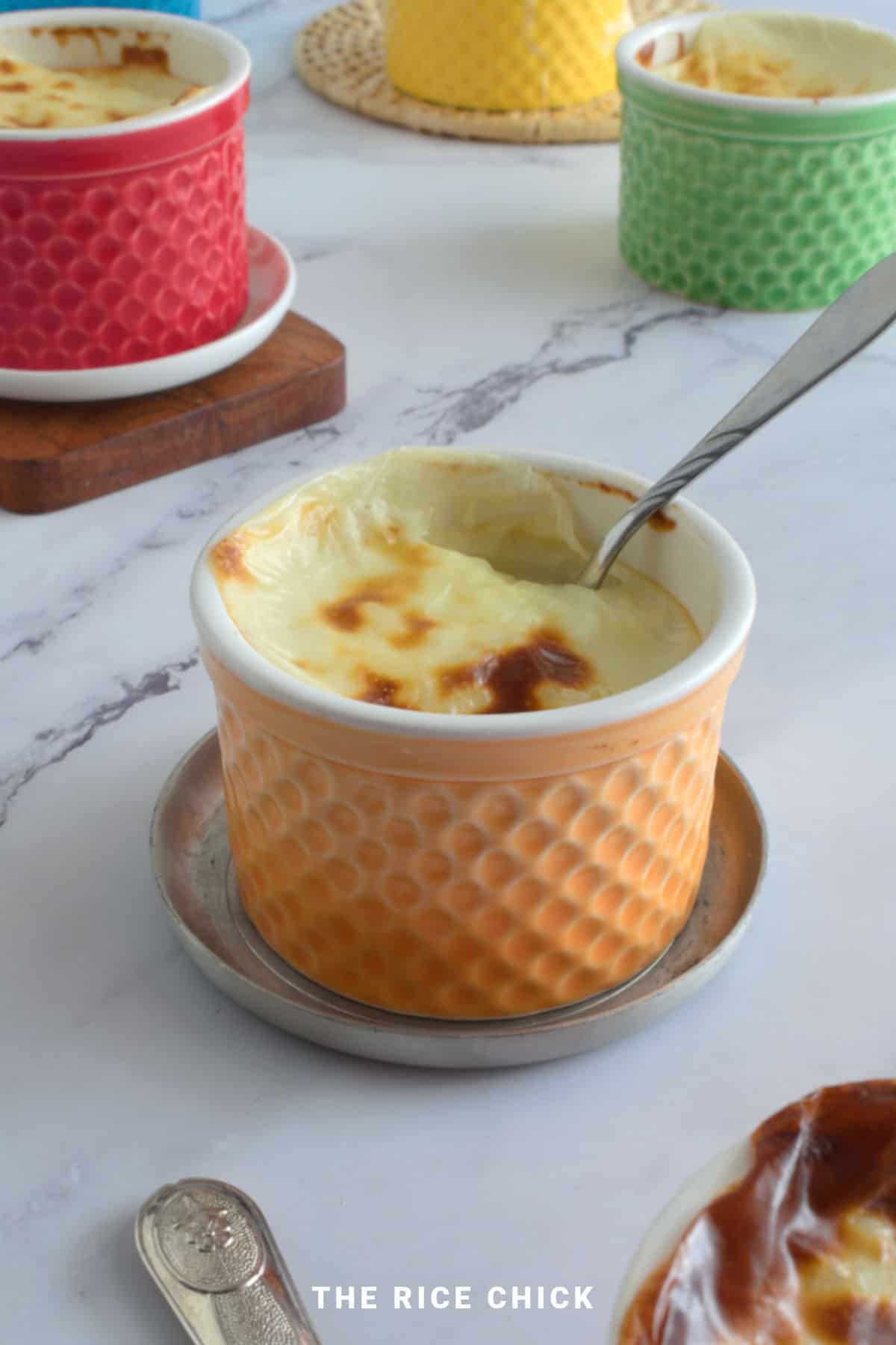 Baked rice pudding with a spoon.