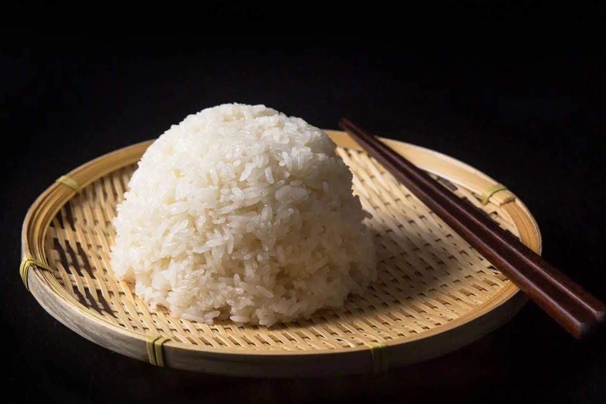 Sticky rice on a woven bowl.