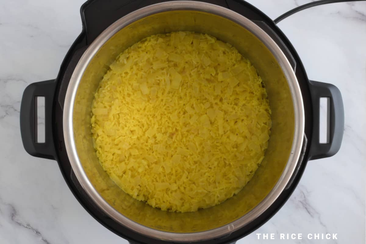 Cooked yellow rice in Instant Pot.