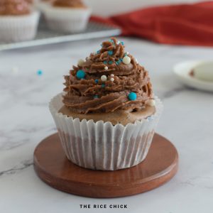Close up image of a cupcake with chocolate frosting.