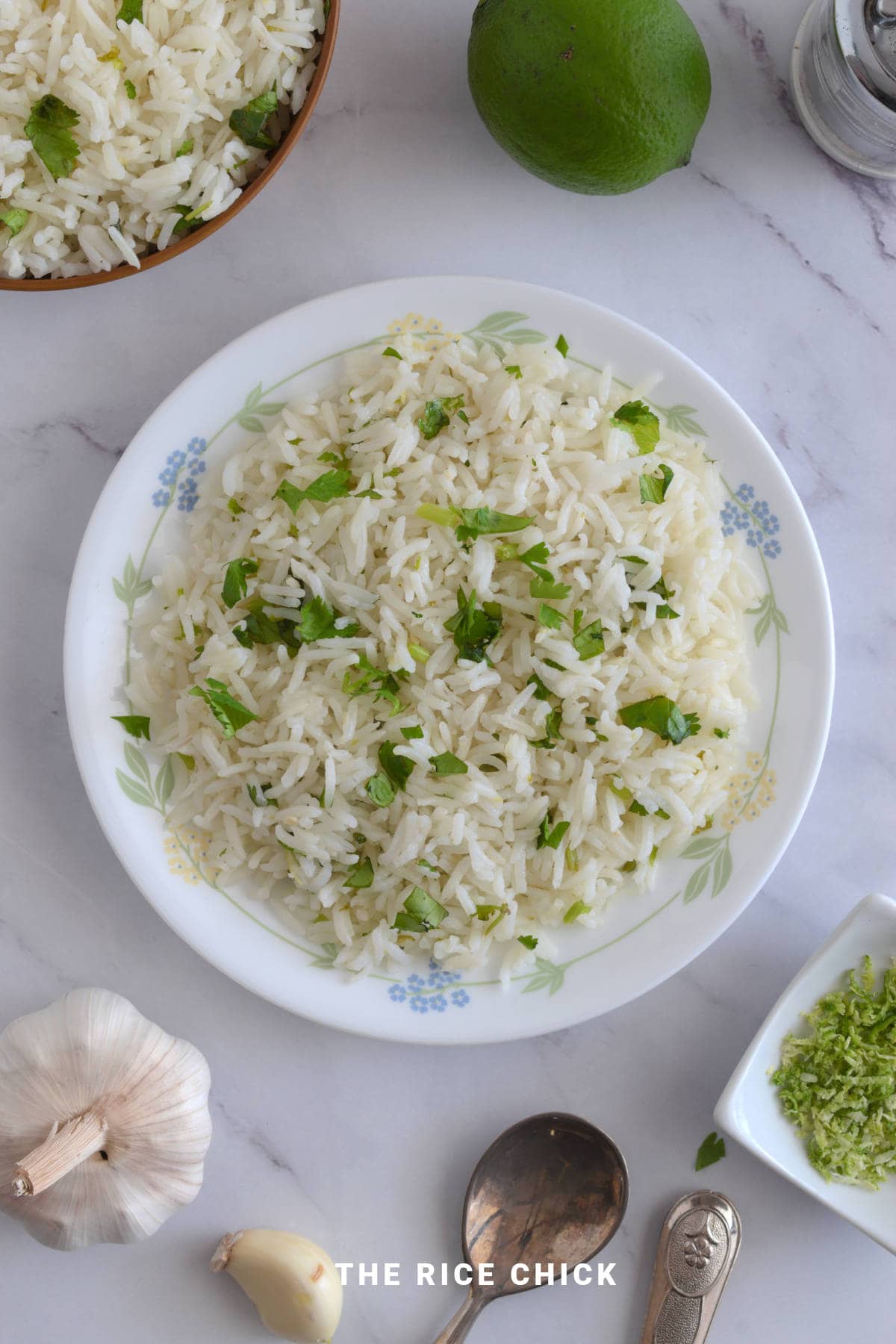 Cilantro and lime rice in a white plate.